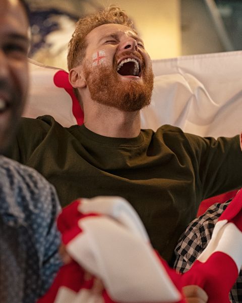 Fans watching rugby live at The Pub